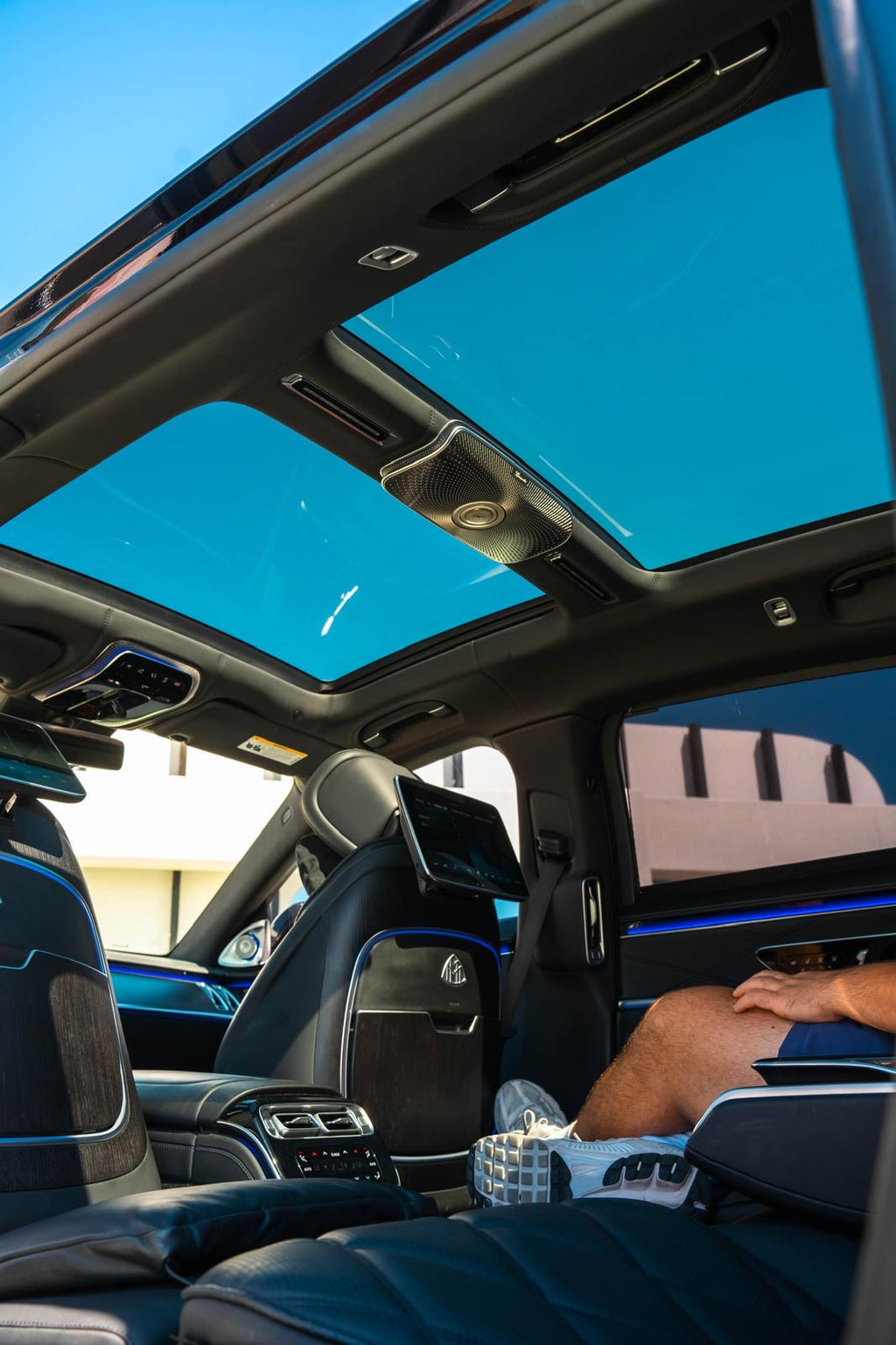 Car interior with a panoramic sunroof.