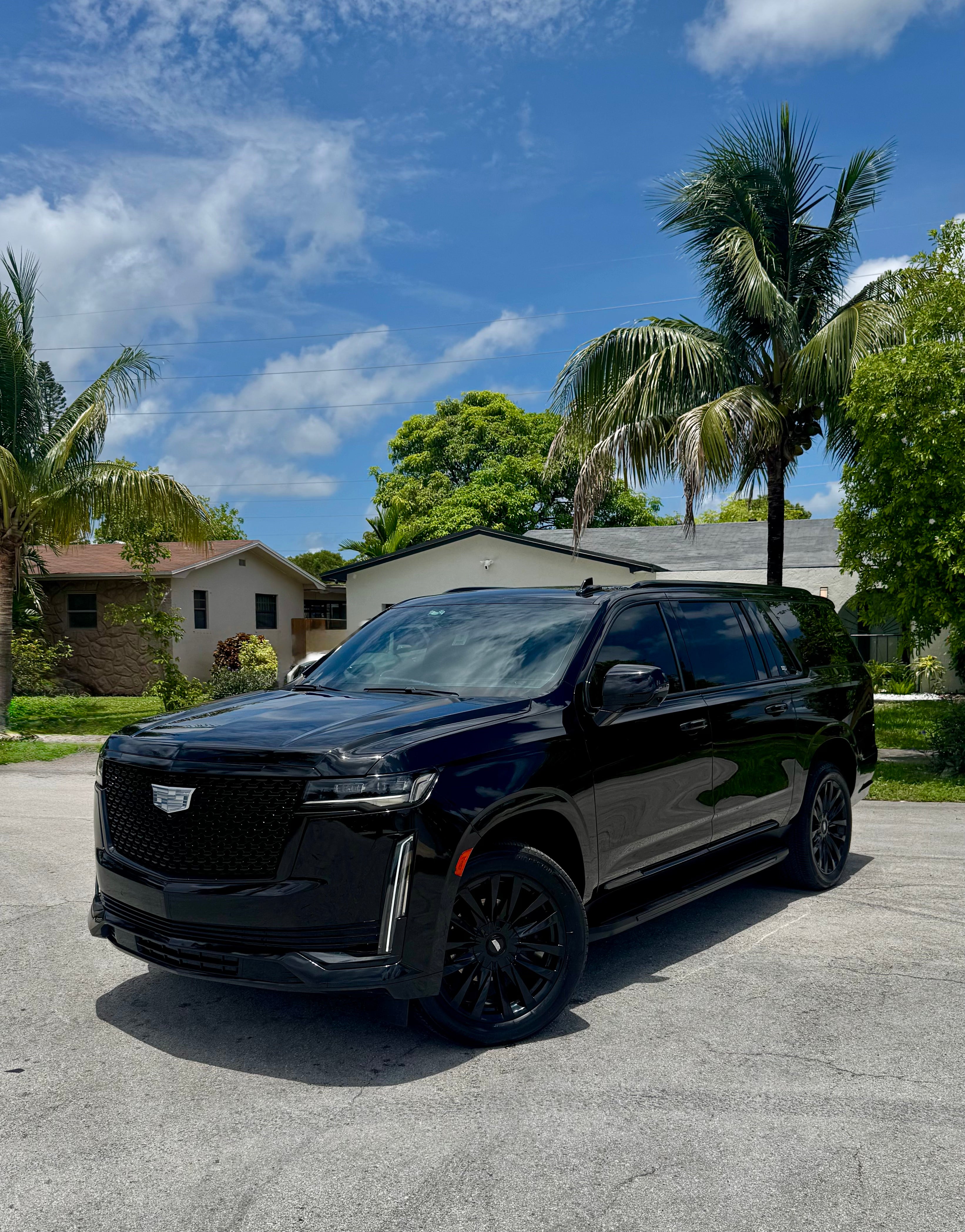 Black SUV parked on a street in Miami