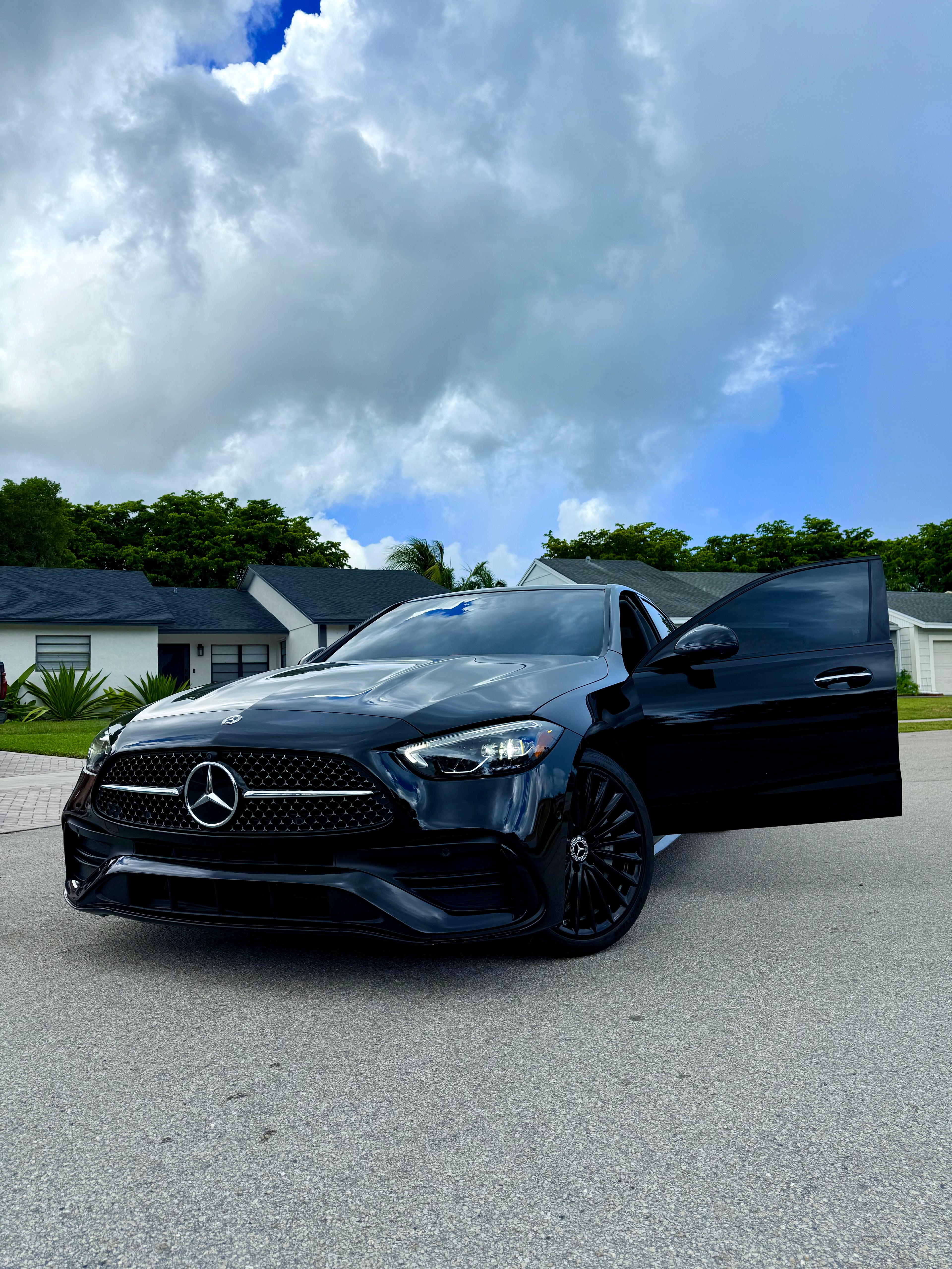 Black Mercedes-Benz C 300 with AMG Package and starry ceiling