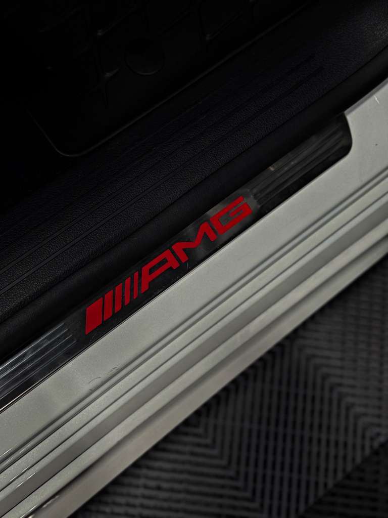 AMG logo on a car door sill