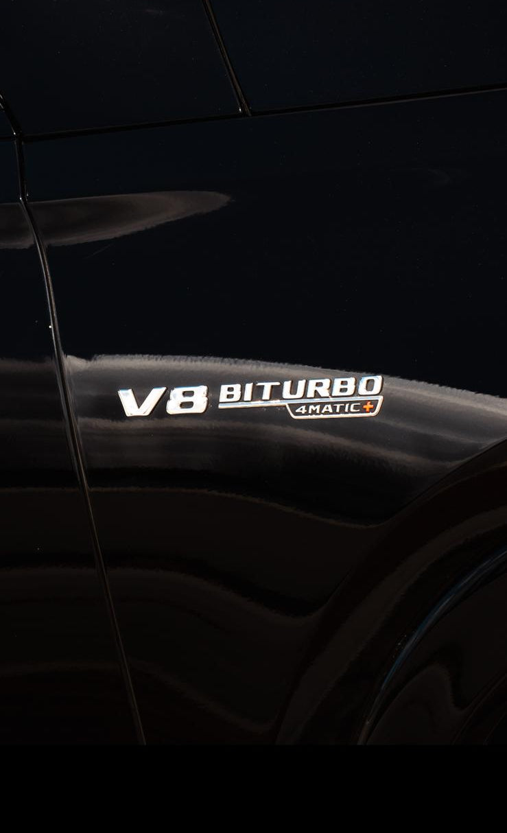 V8 biturbo badge on a black car